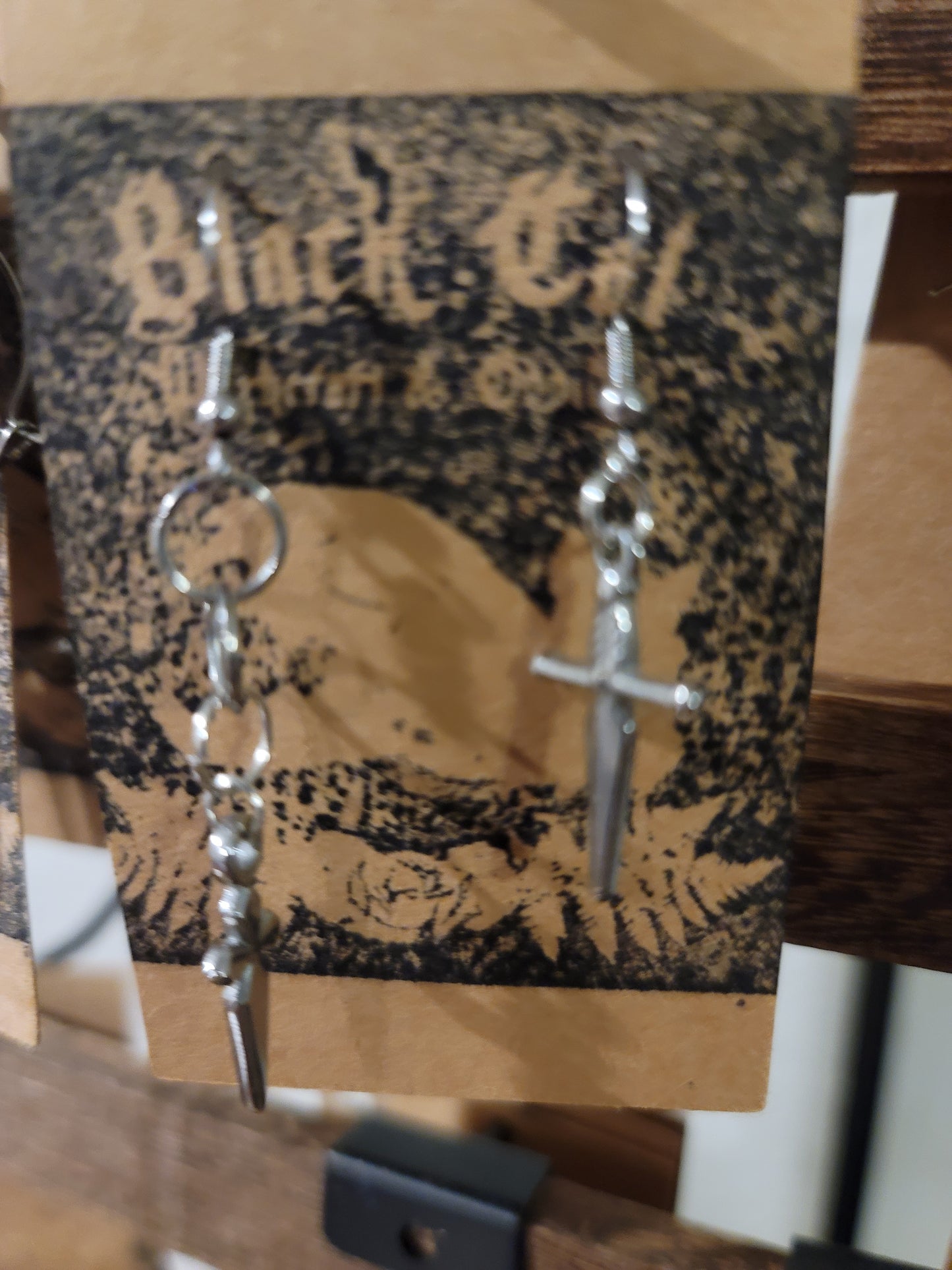 Asymmetrical sword earrings