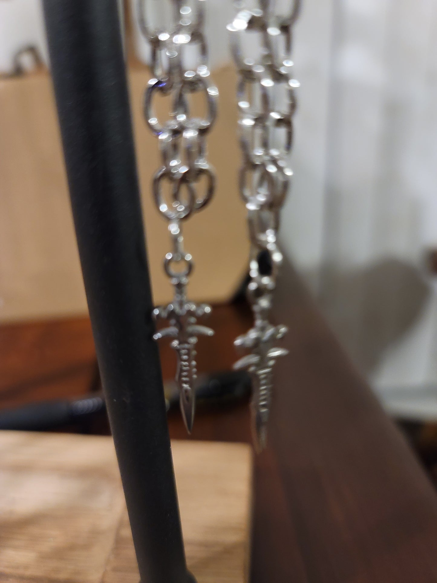 Long chain Sword earrings